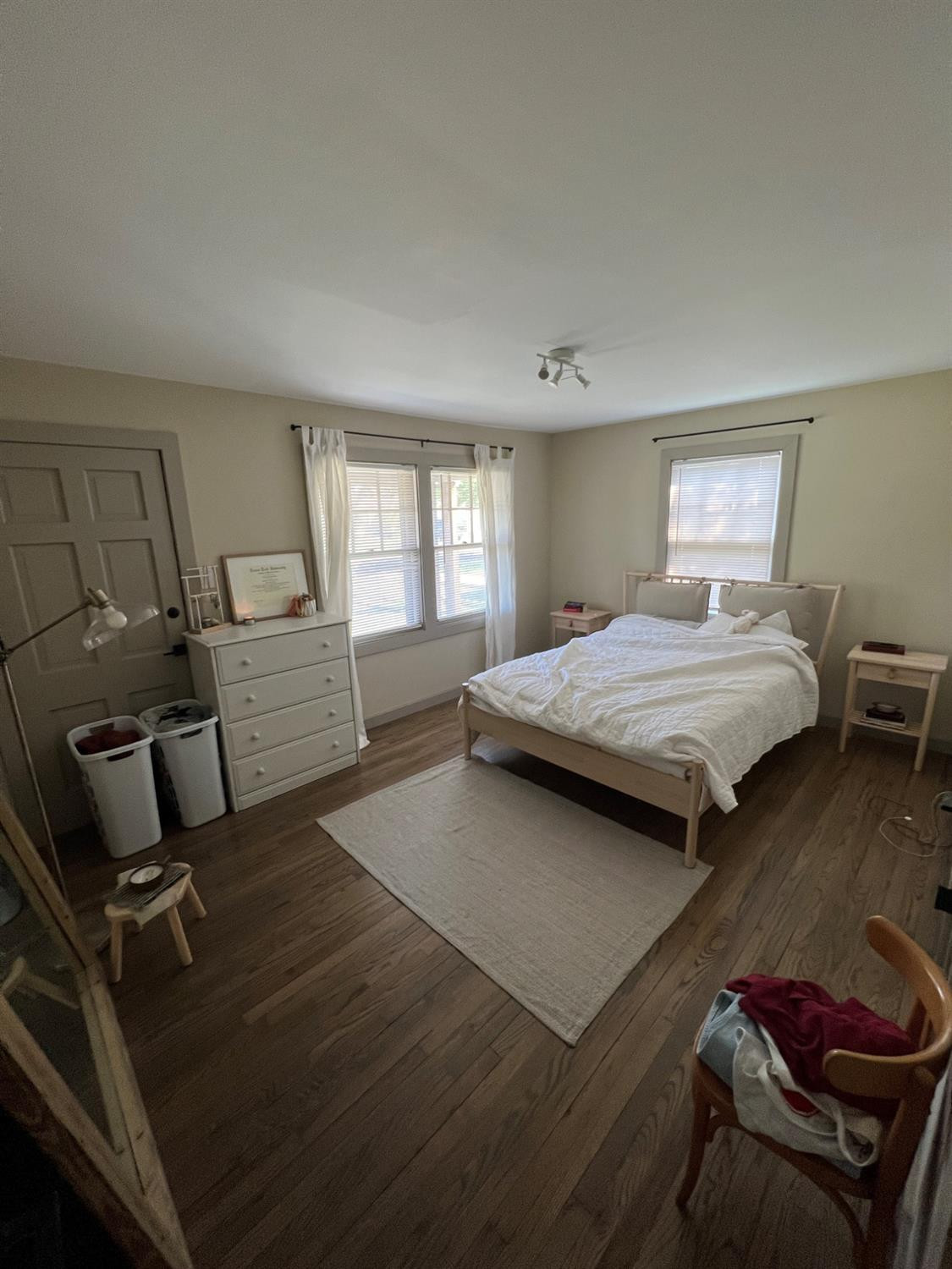 2509 29th Street Lubbock, TX 79410 - Photo 9 of 10 a bedroom with a bed and wooden floor