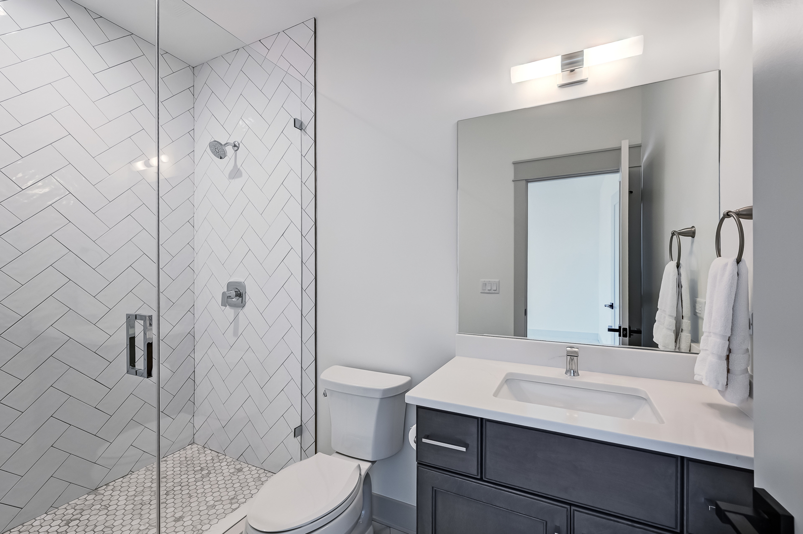 1205 Ridge Road Westmont, IL 60527 - Photo 17 of 25 a bathroom with a sink toilet and shower