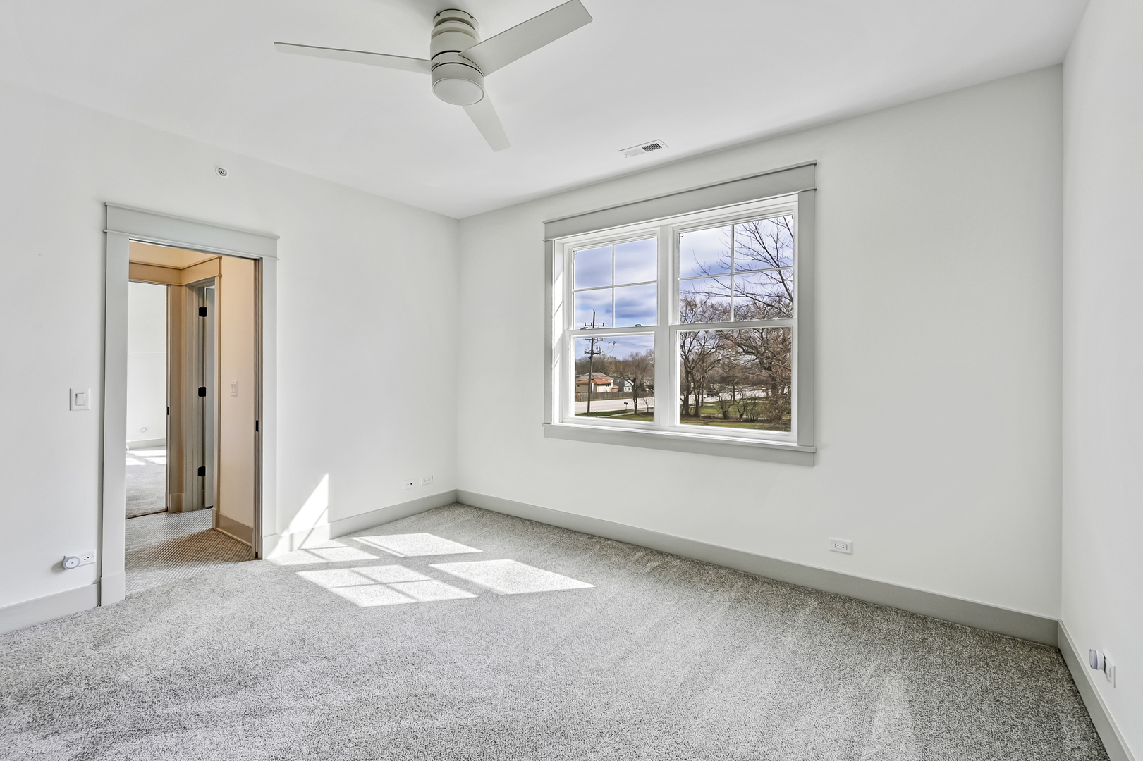 1205 Ridge Road Westmont, IL 60527 - Photo 20 of 25 a view of an empty room with a window