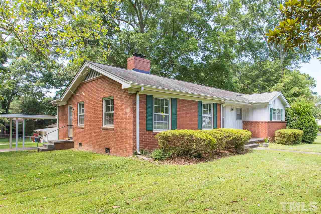 4929 Kaplan Drive Raleigh, NC 27606 - Photo 3 of 30 a front view of house with yard and green space