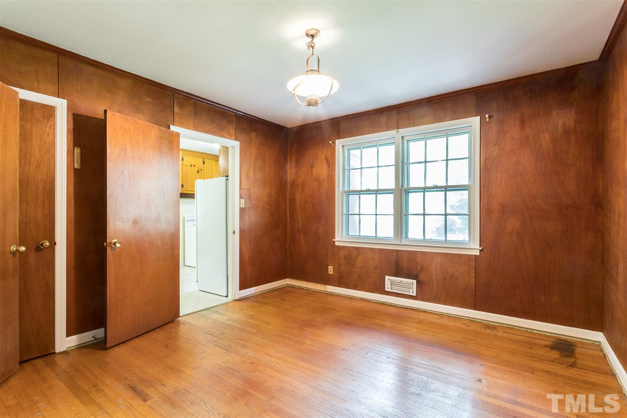 4929 Kaplan Drive Raleigh, NC 27606 - Photo 21 of 30 a view of an empty room with a window