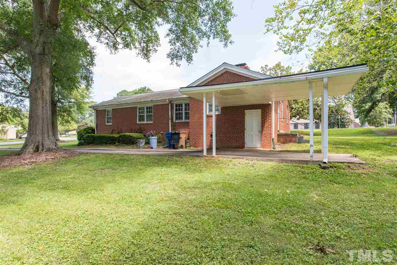 4929 Kaplan Drive Raleigh, NC 27606 - Photo 7 of 30 front view of a house with a yard