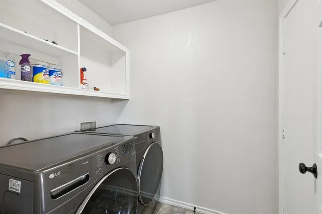 a utility room with dryer and washer