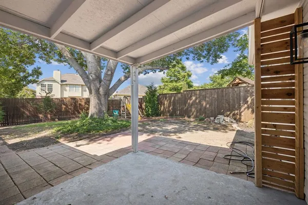 a view of a backyard with a garden