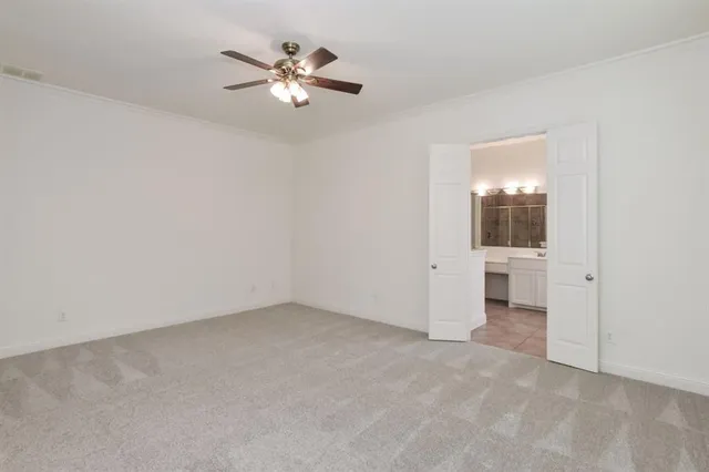 an empty room with a bathroom