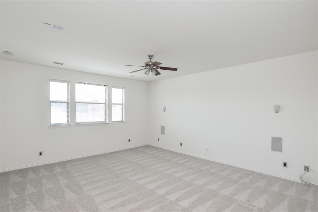 11007 Southwyck Drive Frisco, TX 75033 - Photo 22 of 36 a view of a room with window and ceiling fan