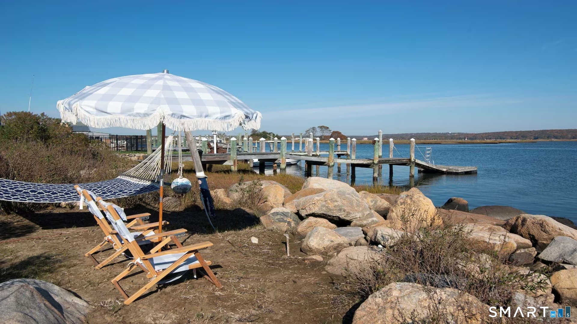 114 Jupiter Point Road Groton, CT 06340 - Photo 24 of 34 Hammock/relaxation area. Enjoy peaceful moments in the hammock by the water.