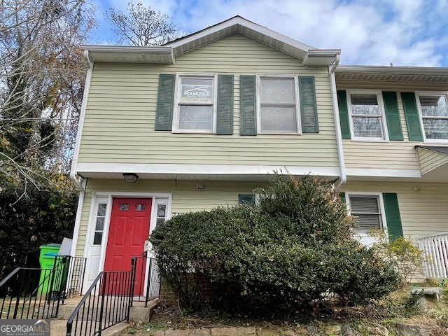 710 Stratford Green Avondale Estates, GA 30002 - Photo 1 of 9 a front view of a house with a yard