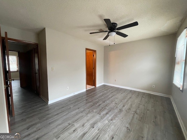 710 Stratford Green Avondale Estates, GA 30002 - Photo 6 of 9 a view of empty room with wooden floor and fan