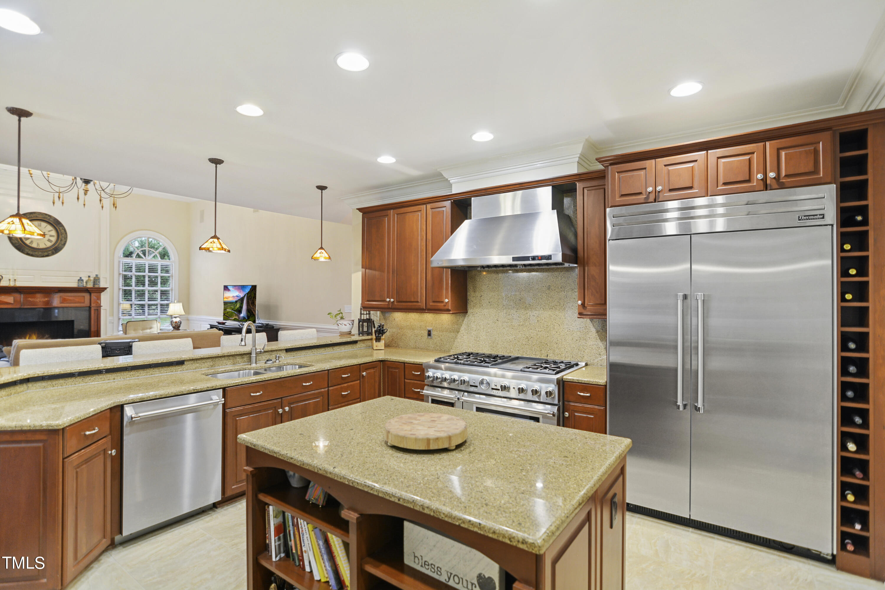11004 Brass Kettle Road Raleigh, NC 27614 - Photo 15 of 57 a kitchen with a refrigerator and a sink
