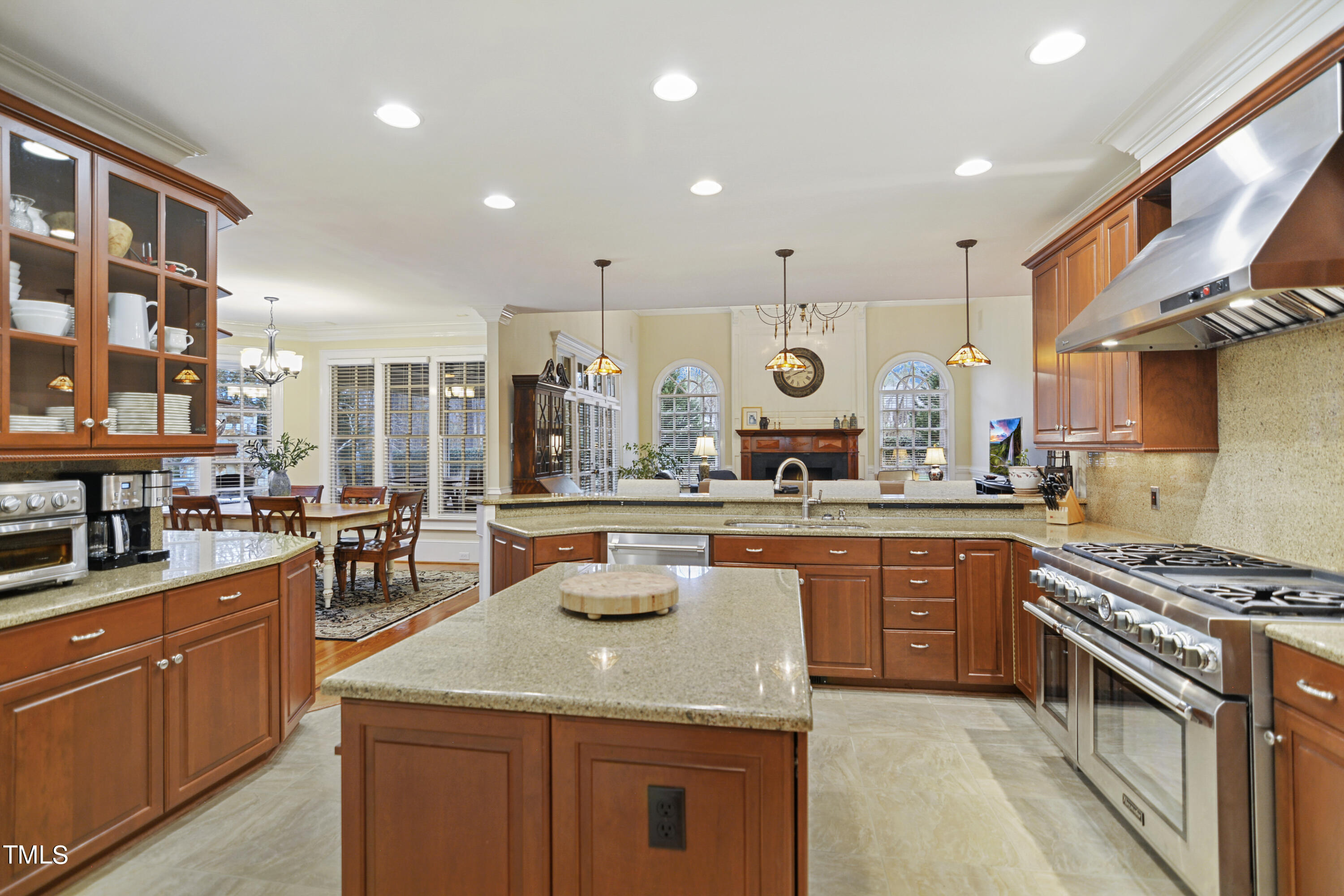 11004 Brass Kettle Road Raleigh, NC 27614 - Photo 16 of 57 a kitchen with stainless steel appliances granite countertop a stove and a sink