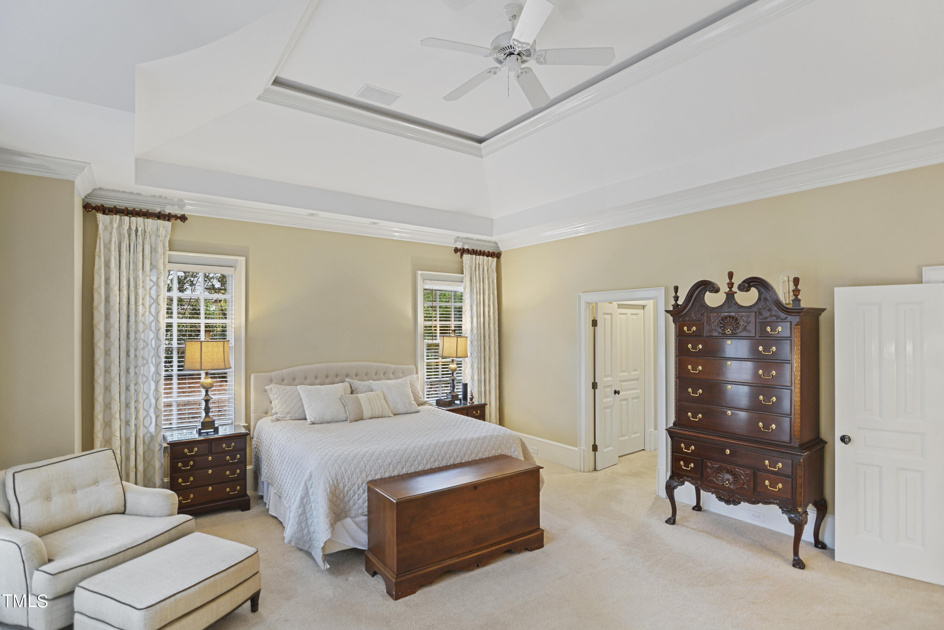 11004 Brass Kettle Road Raleigh, NC 27614 - Photo 25 of 57 a bedroom with a bed a couch and a dresser