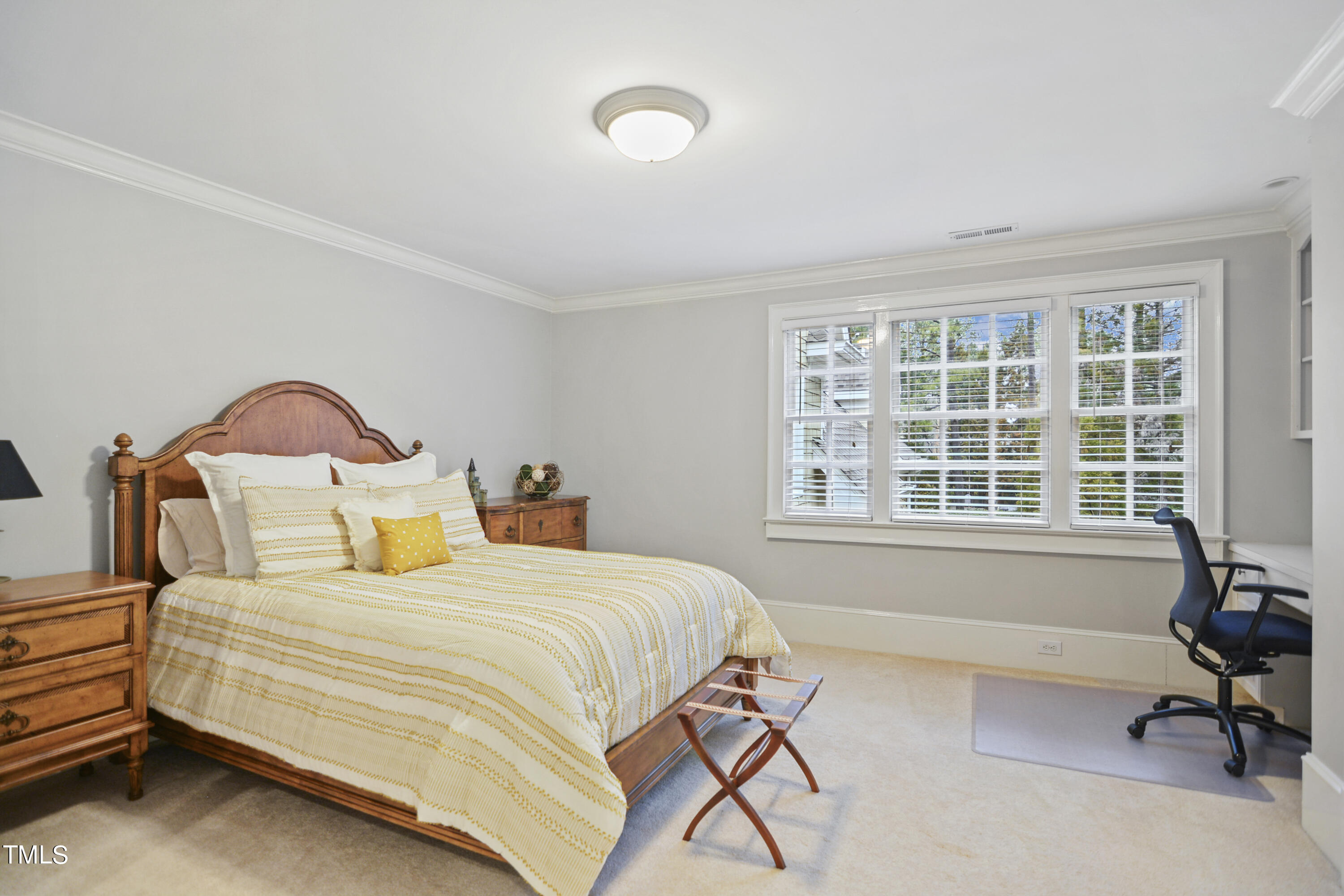 11004 Brass Kettle Road Raleigh, NC 27614 - Photo 31 of 57 a bedroom with a bed chair and a window