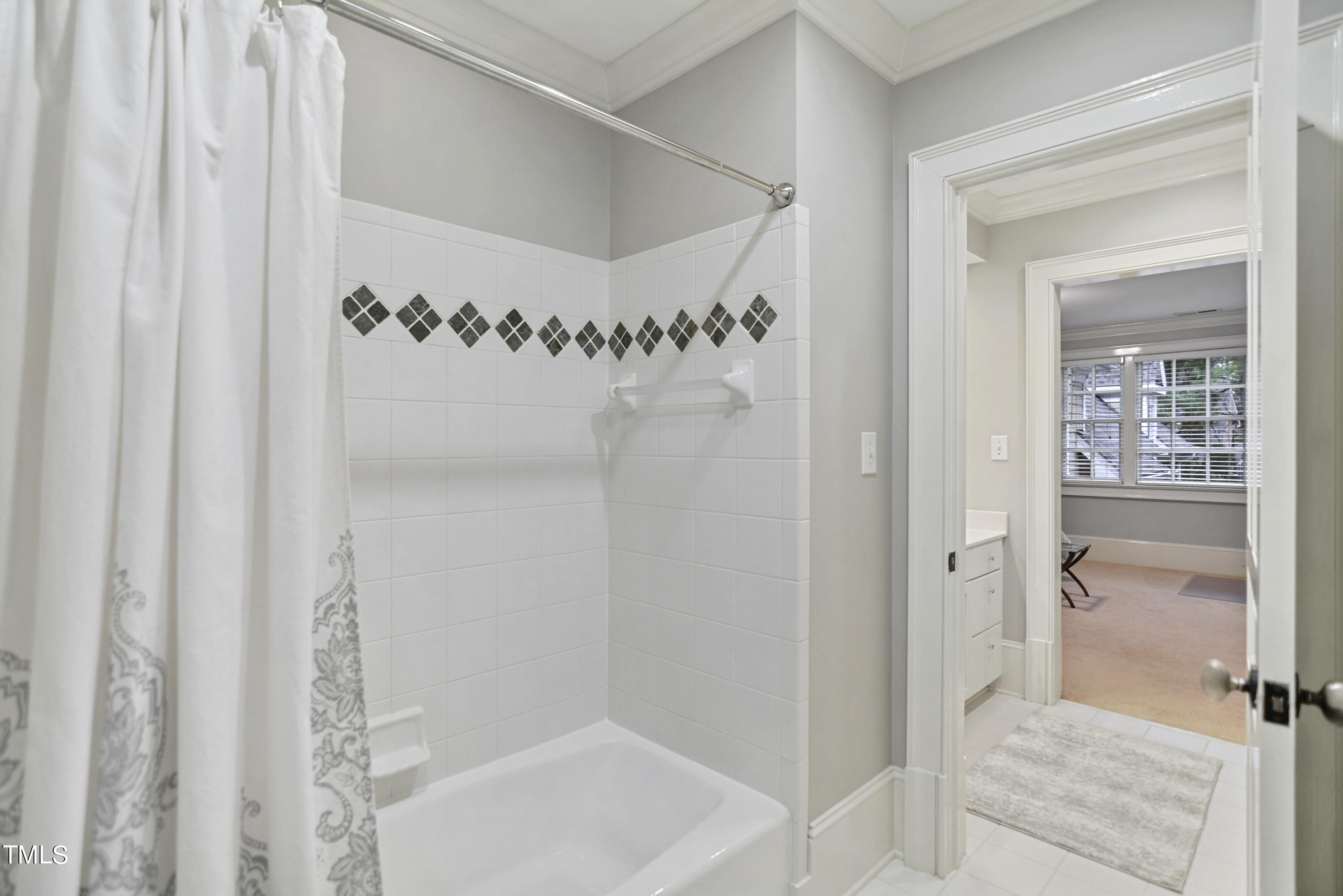 11004 Brass Kettle Road Raleigh, NC 27614 - Photo 34 of 57 a bathroom with a shower