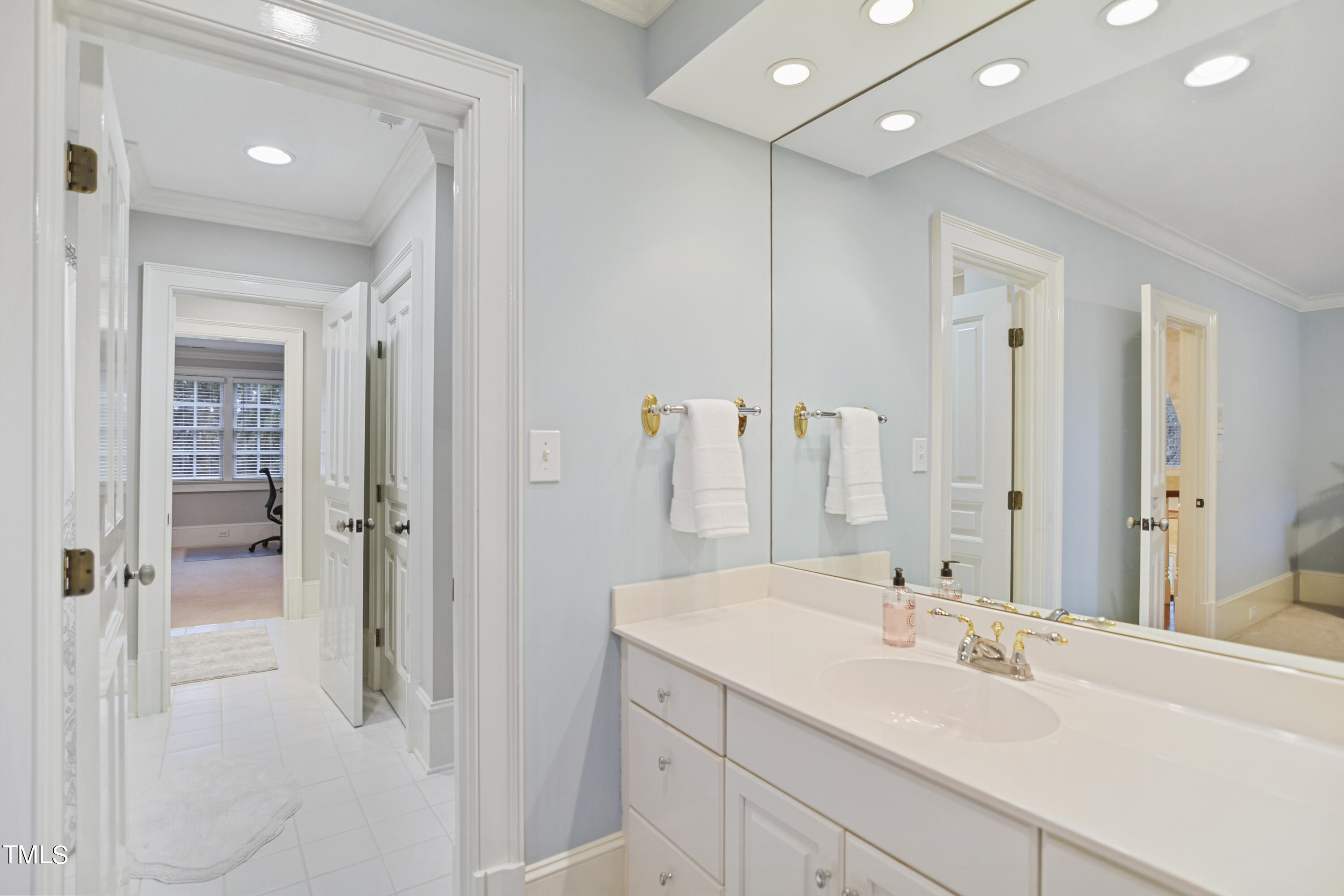 11004 Brass Kettle Road Raleigh, NC 27614 - Photo 35 of 57 a bathroom with a double vanity sink mirror and double