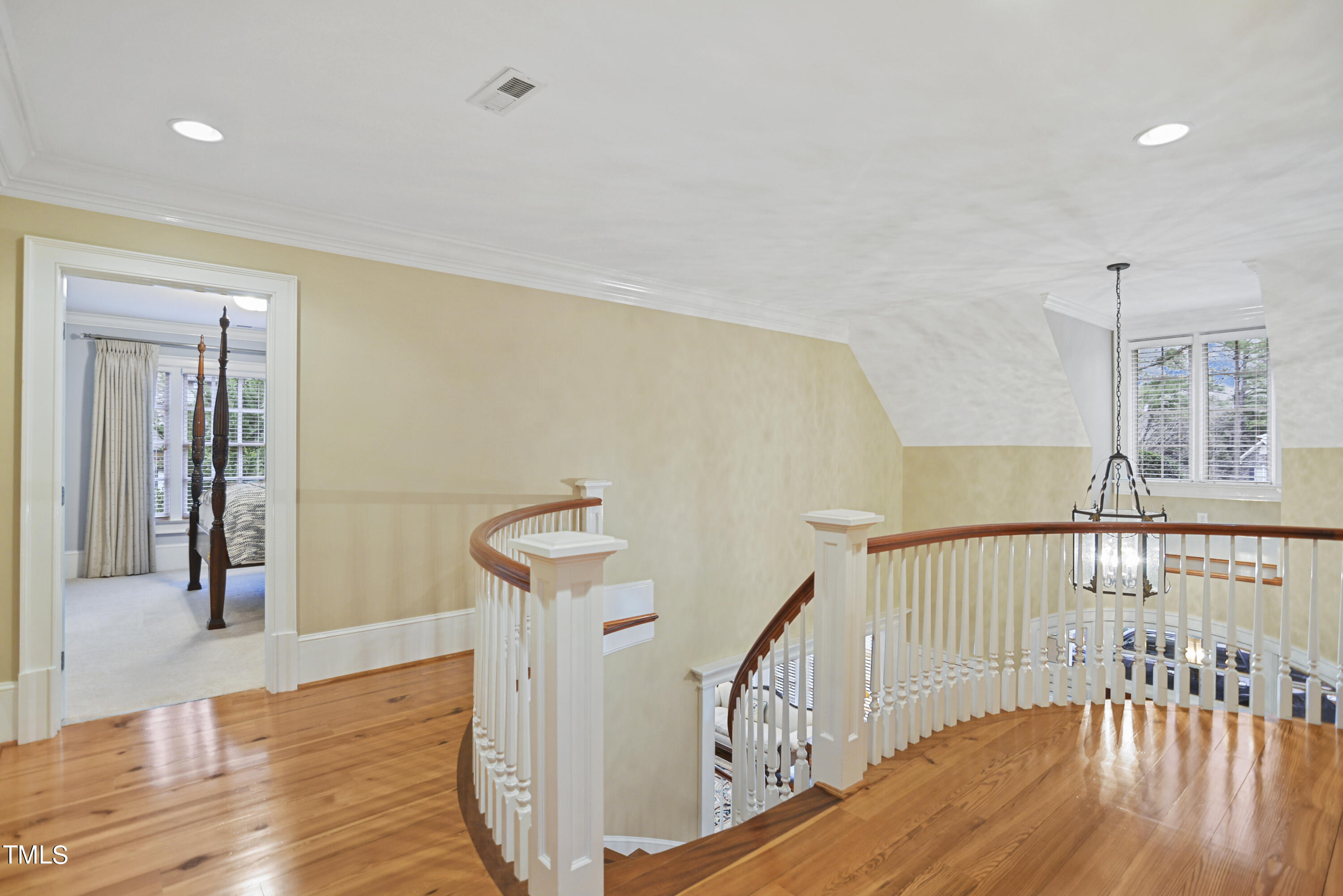 11004 Brass Kettle Road Raleigh, NC 27614 - Photo 39 of 57 a view of hallway with wooden floor