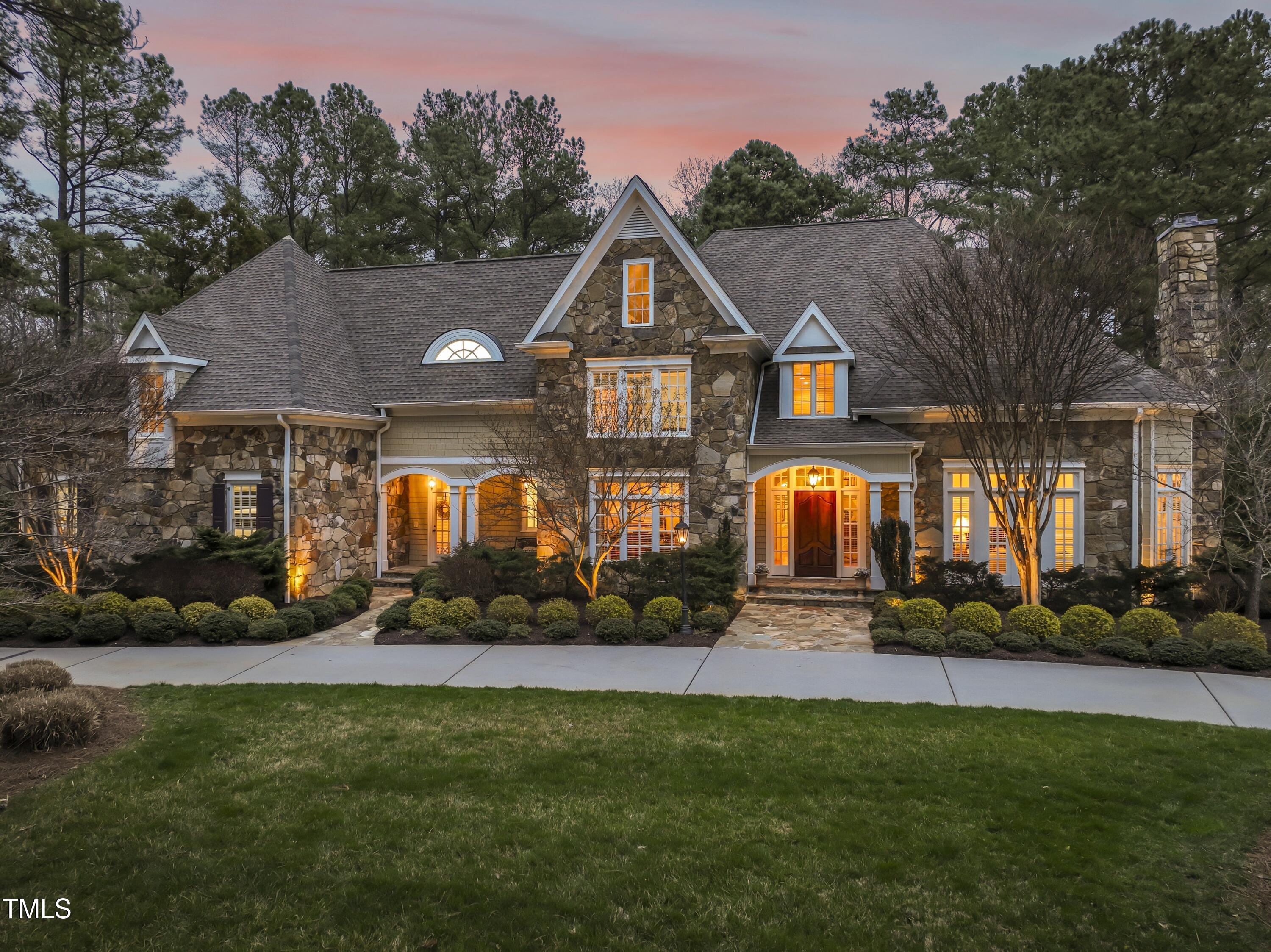 11004 Brass Kettle Road Raleigh, NC 27614 - Photo 4 of 57 a front view of a house with a yard