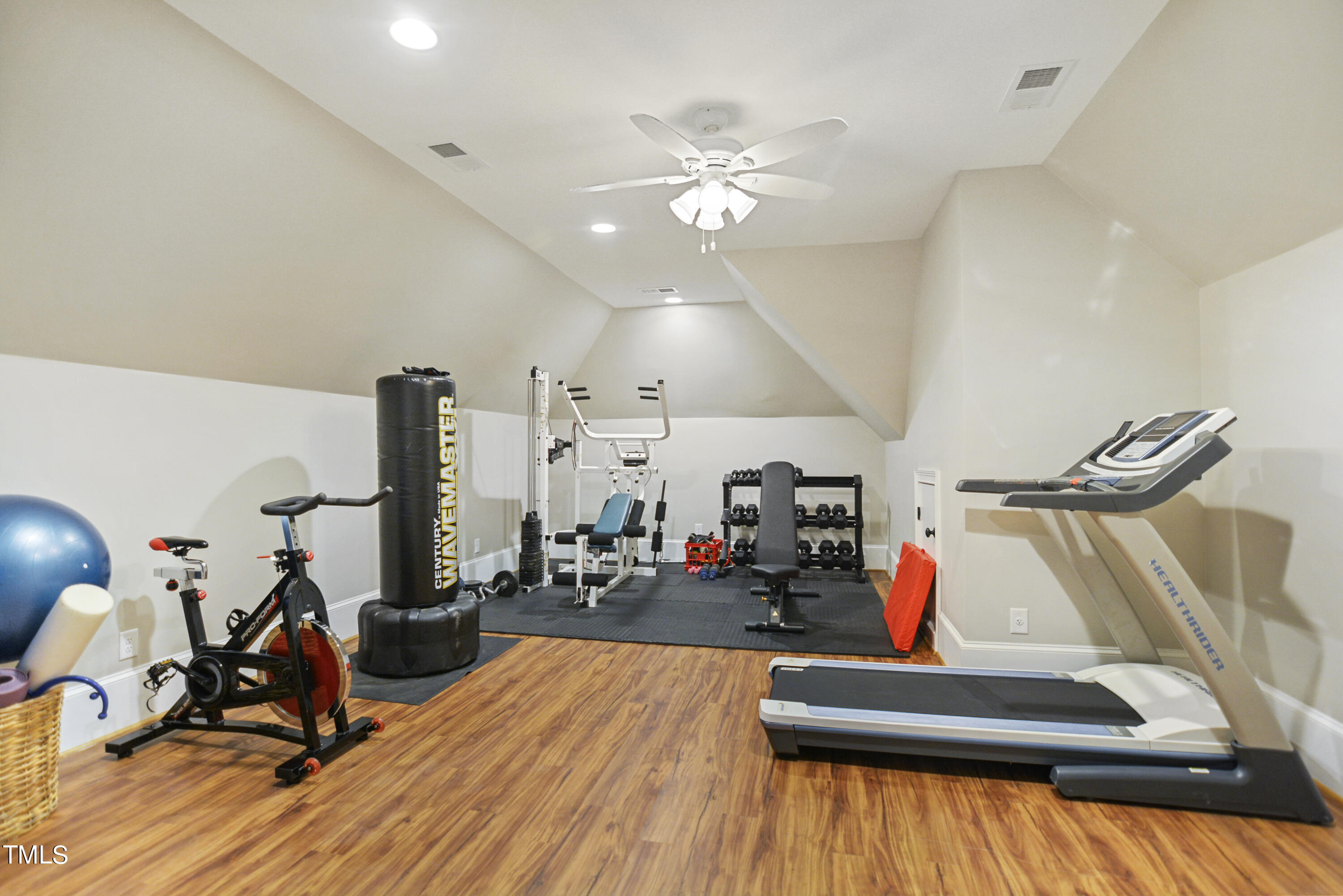 11004 Brass Kettle Road Raleigh, NC 27614 - Photo 41 of 57 a view of a room with gym equipment