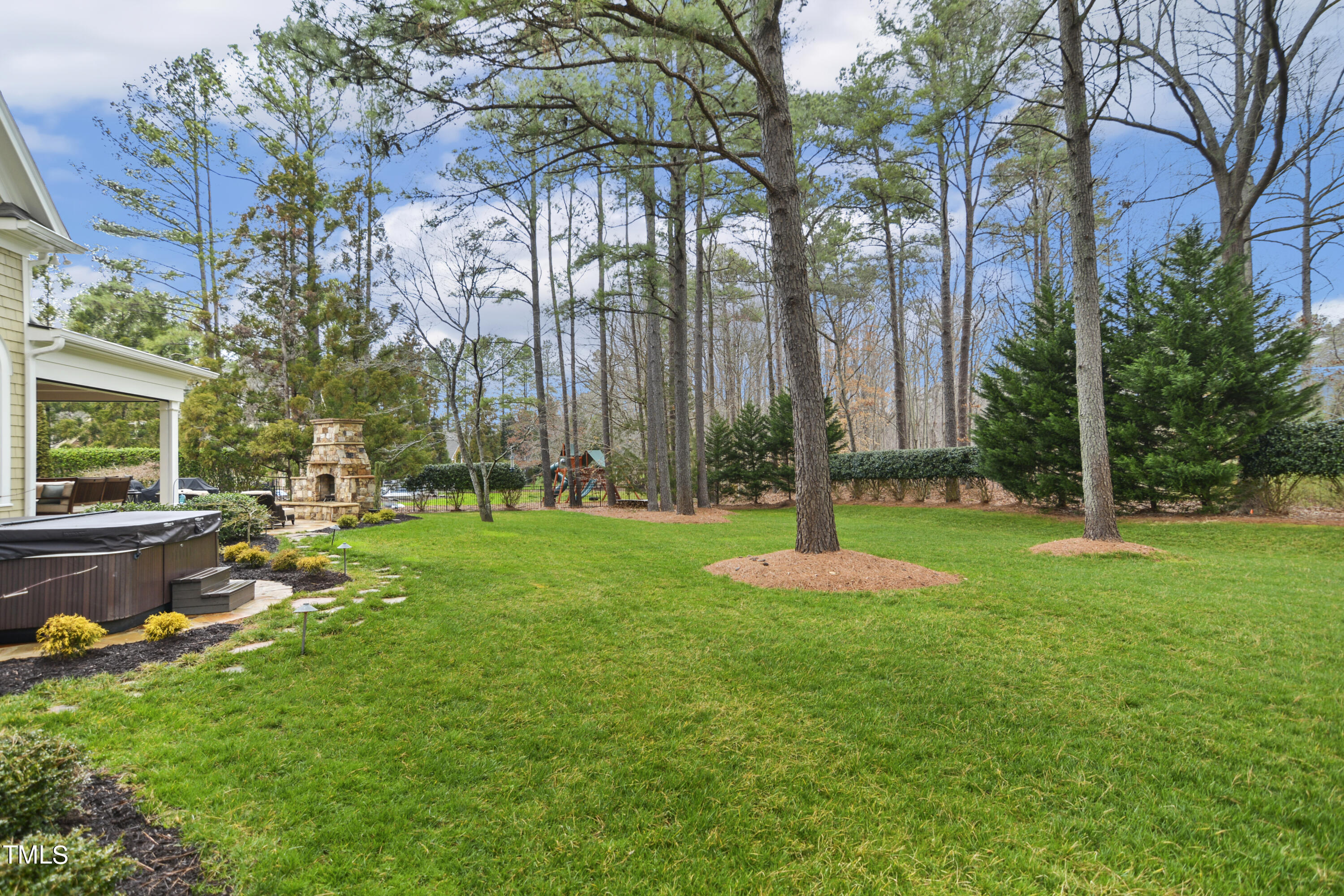 11004 Brass Kettle Road Raleigh, NC 27614 - Photo 48 of 57 a garden with trees in the background