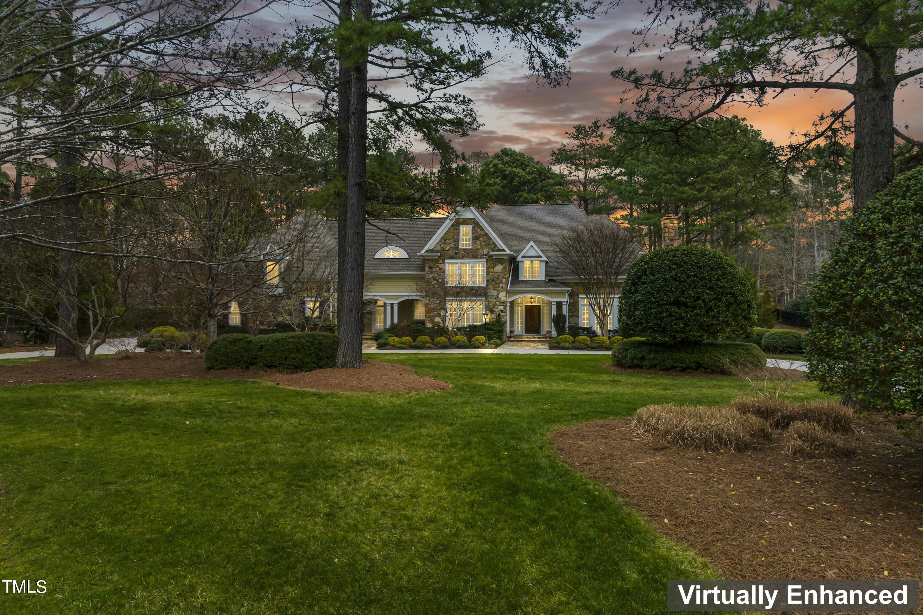 11004 Brass Kettle Road Raleigh, NC 27614 - Photo 5 of 57 a front view of a house with a yard