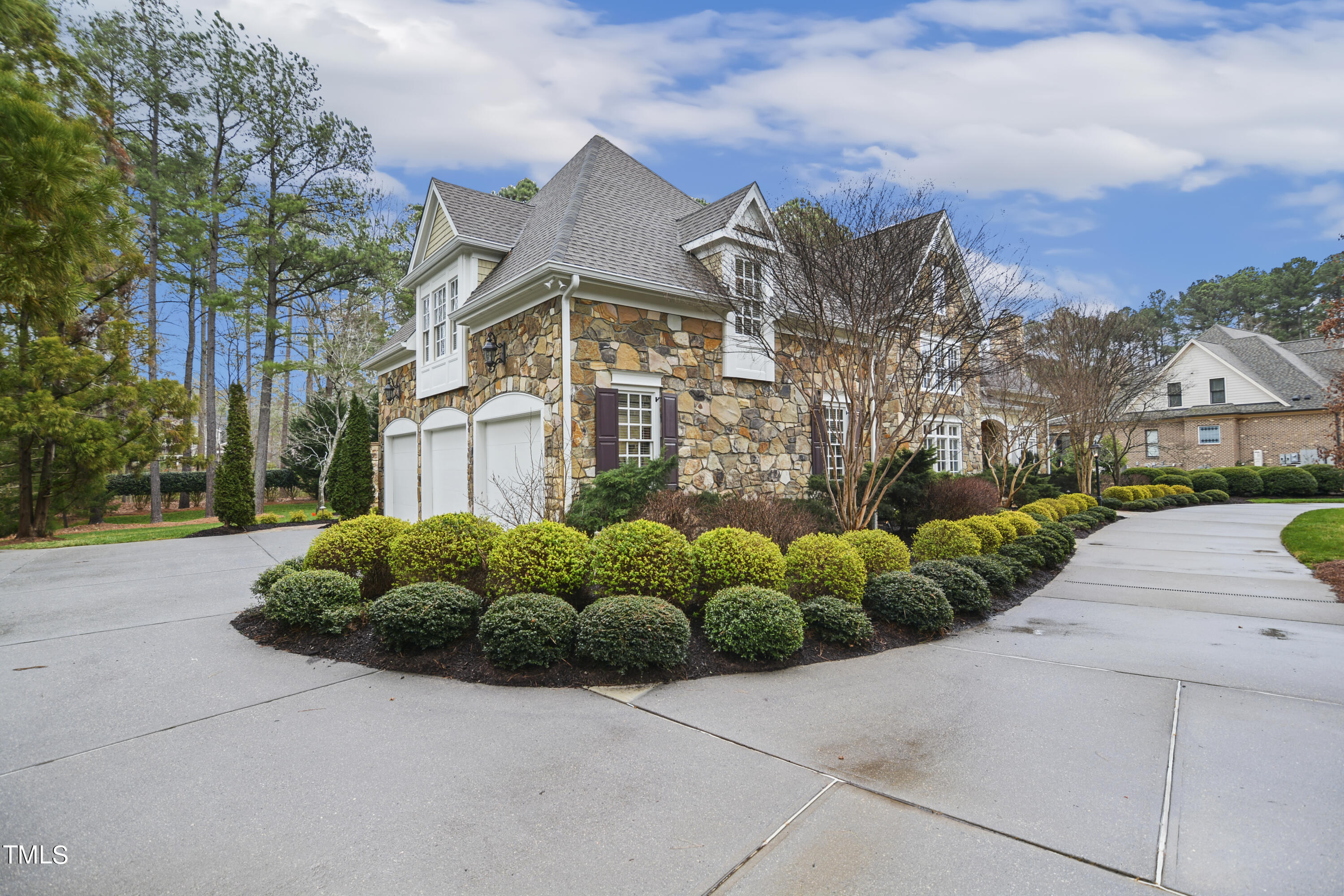 11004 Brass Kettle Road Raleigh, NC 27614 - Photo 52 of 57 a front view of a house with a yard and plants