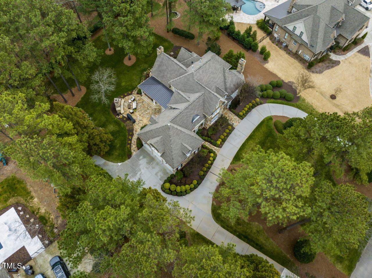 11004 Brass Kettle Road Raleigh, NC 27614 - Photo 54 of 57 an aerial view of a house with garden space and trees all around