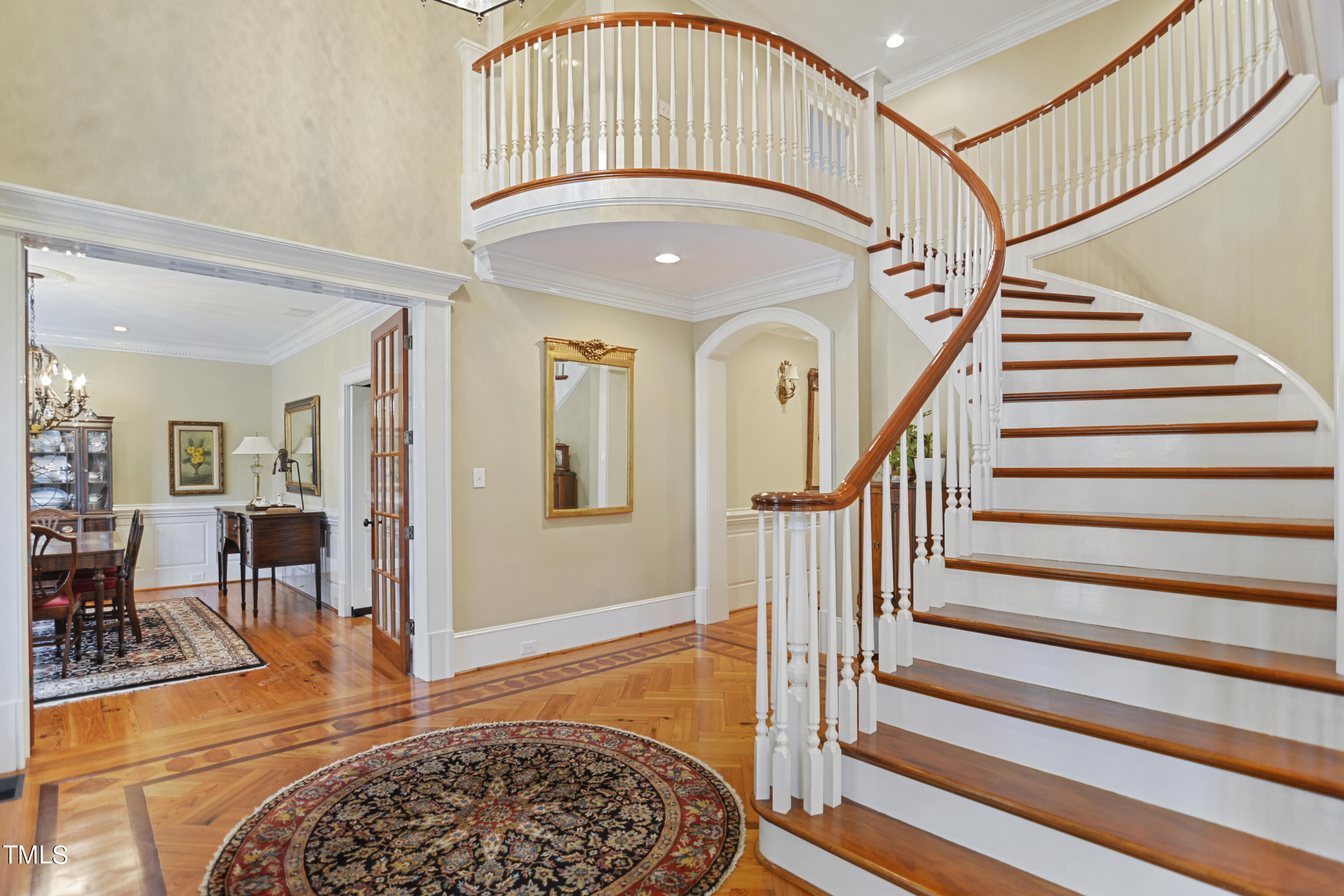 11004 Brass Kettle Road Raleigh, NC 27614 - Photo 6 of 57 a view of entryway livingroom and hall with wooden floor