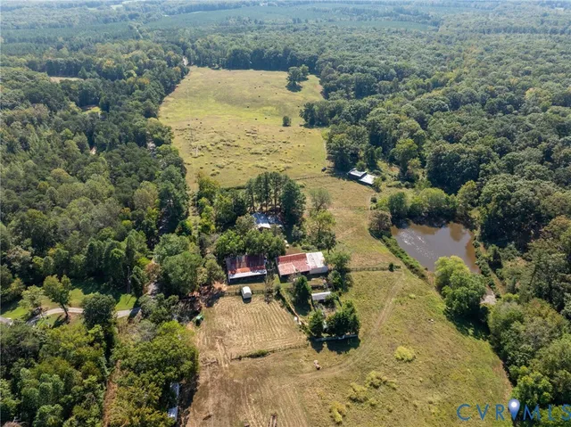 an aerial view of residential house with outdoor space