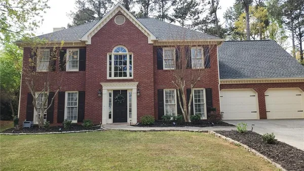 front view of house with a yard