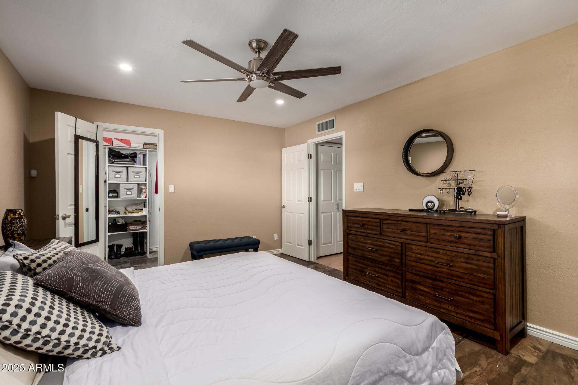5319 North 15th Street Phoenix, AZ 85014 - Photo 11 of 30 a bedroom with a bed and cabinet