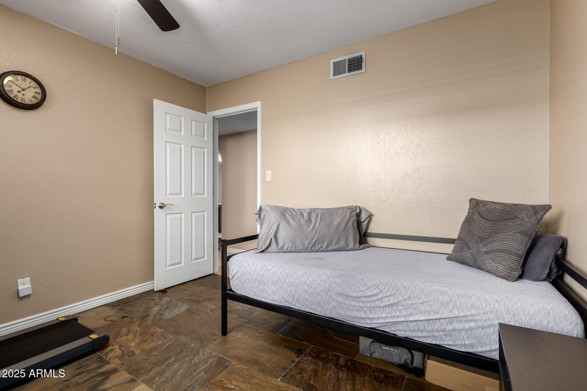 5319 North 15th Street Phoenix, AZ 85014 - Photo 18 of 30 a bedroom with a bed and a window