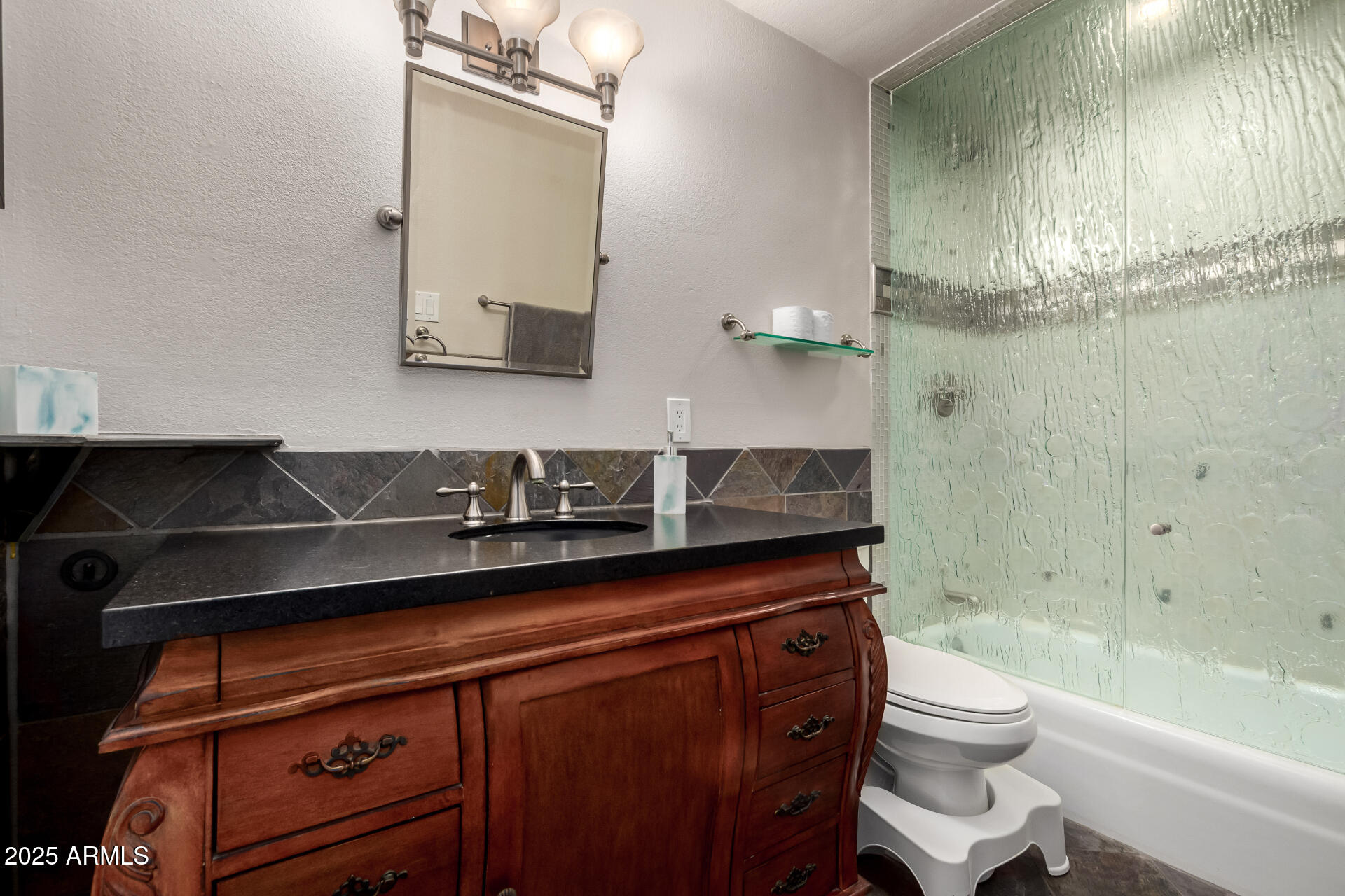 5319 North 15th Street Phoenix, AZ 85014 - Photo 19 of 30 a bathroom with a sink a toilet and shower