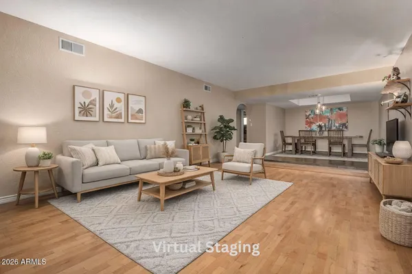 a living room with furniture and a couch