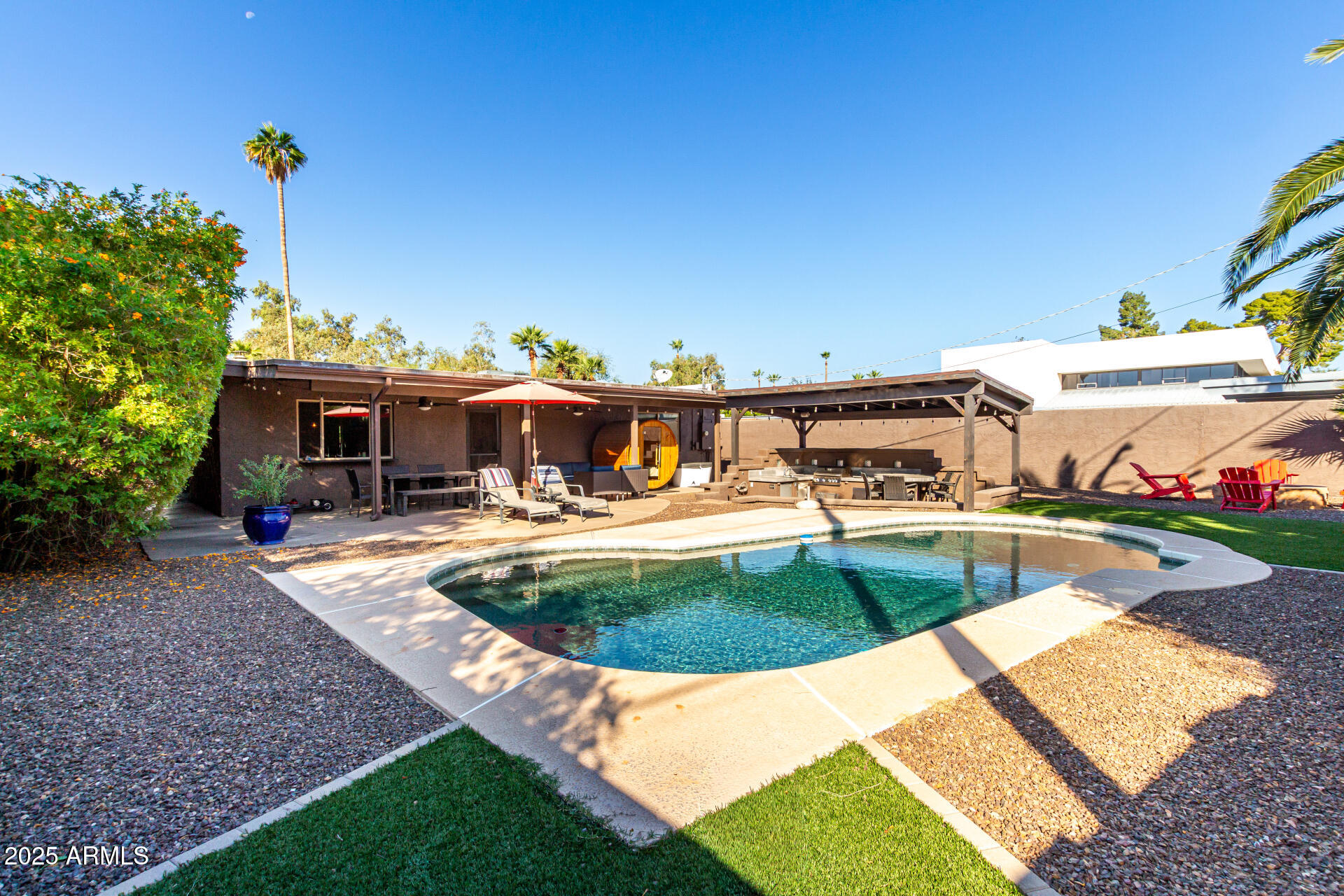 5319 North 15th Street Phoenix, AZ 85014 - Photo 25 of 30 a view of a house with swimming pool