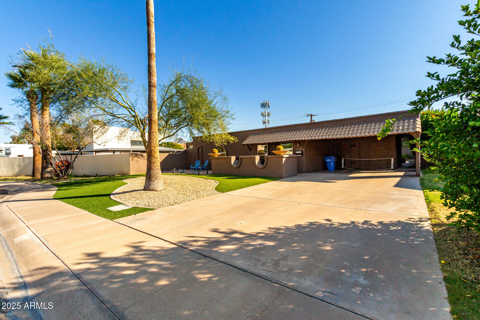 5319 North 15th Street Phoenix, AZ 85014 - Photo 29 of 30 a view of a house with a yard and tree s