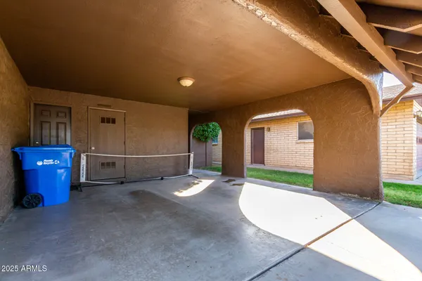a view of a house with a yard and tree s