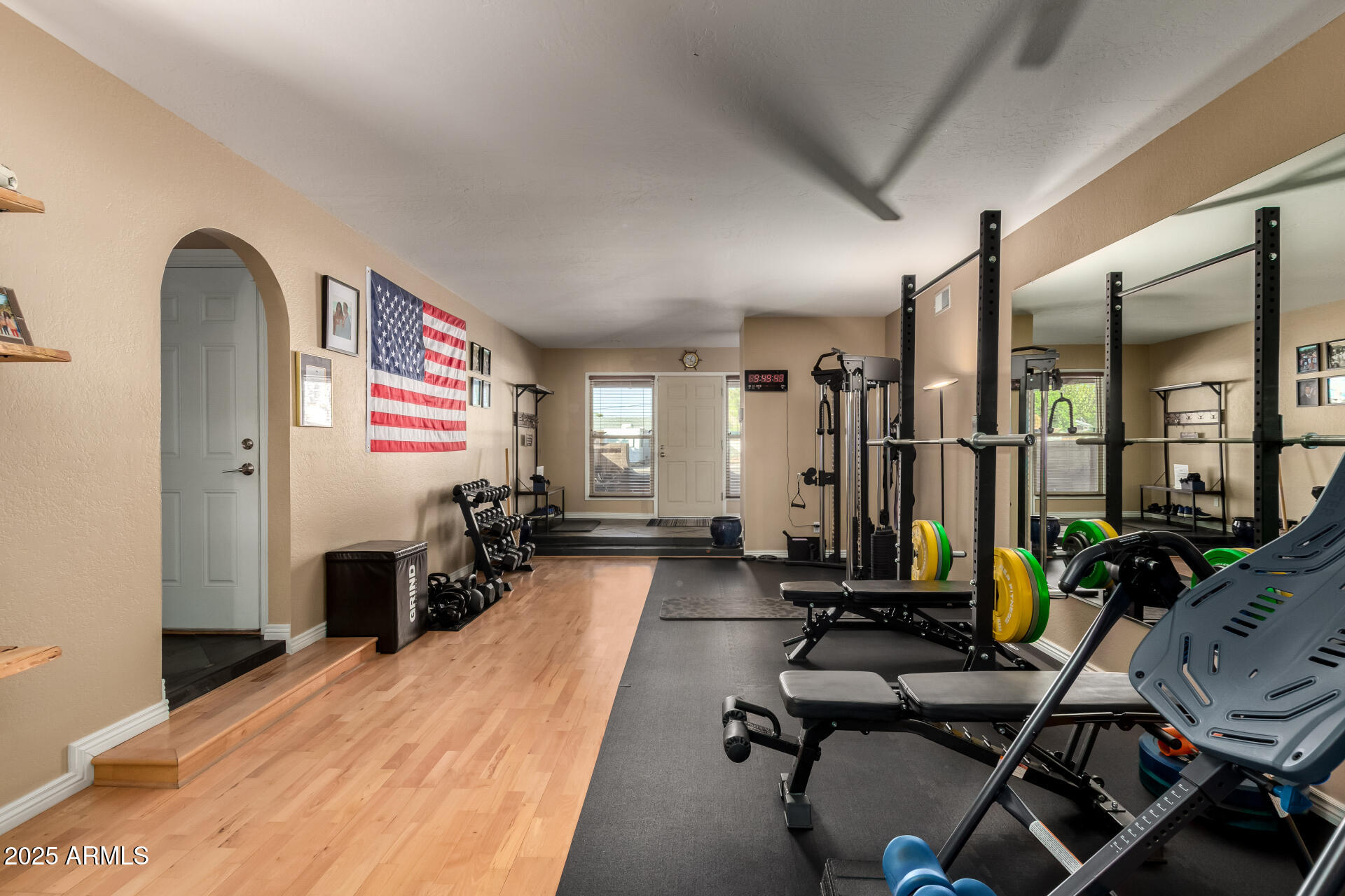 5319 North 15th Street Phoenix, AZ 85014 - Photo 9 of 30 a room with gym equipment and a large window