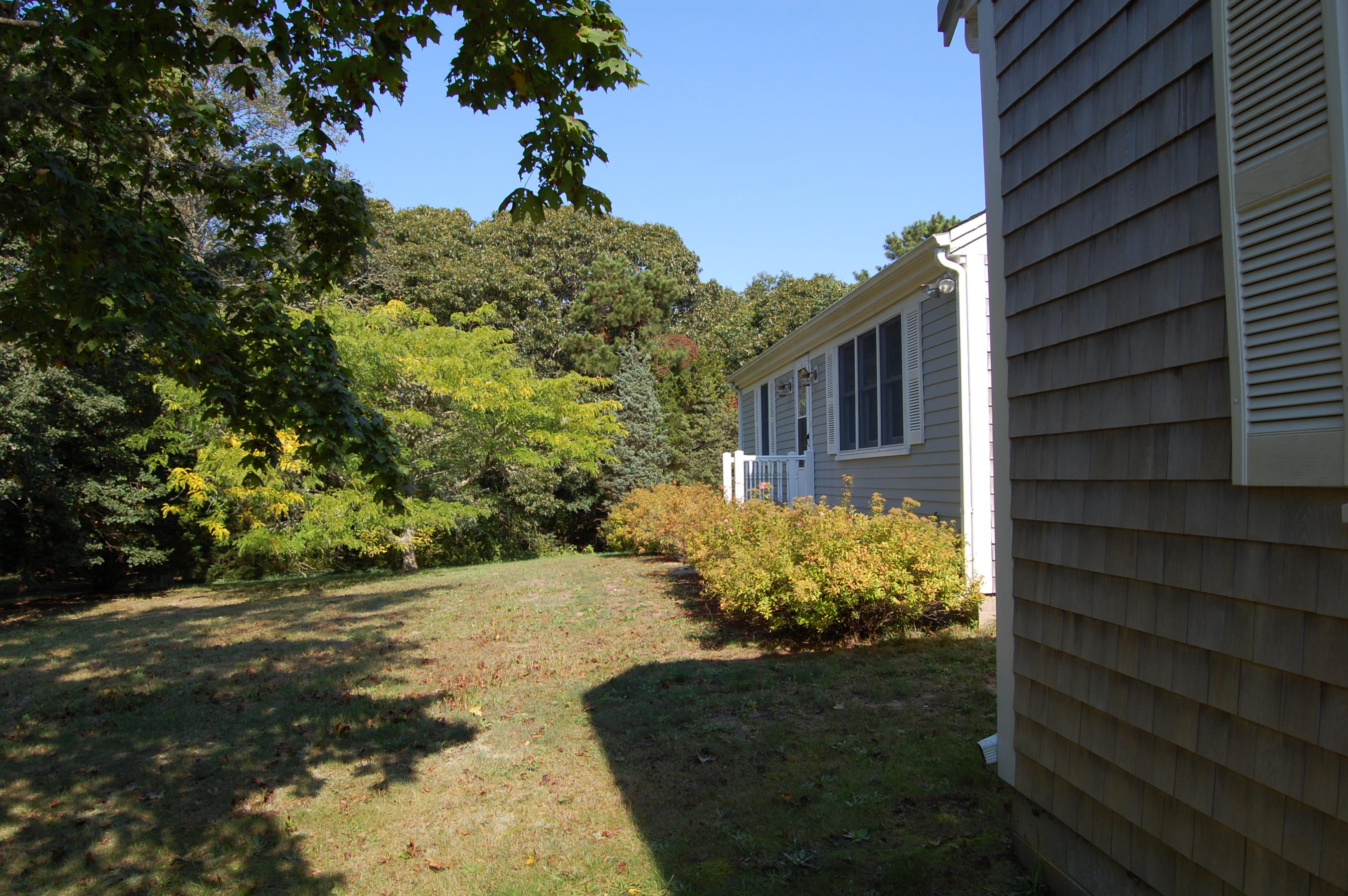35 Nickerson Road Eastham, MA 02642 - Photo 20 of 35 a view of a house with a yard