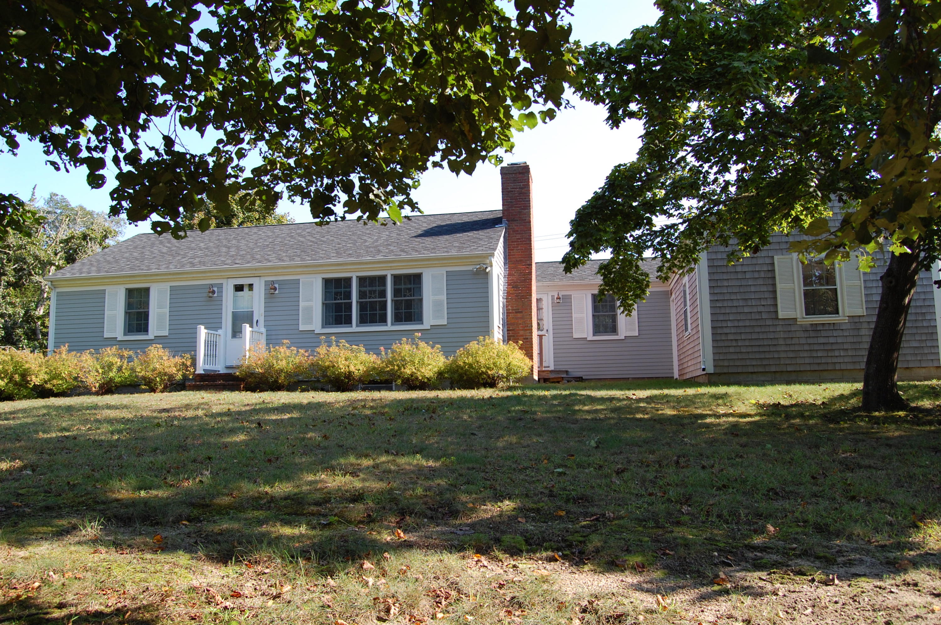 35 Nickerson Road Eastham, MA 02642 - Photo 3 of 35 a front view of a house with a garden