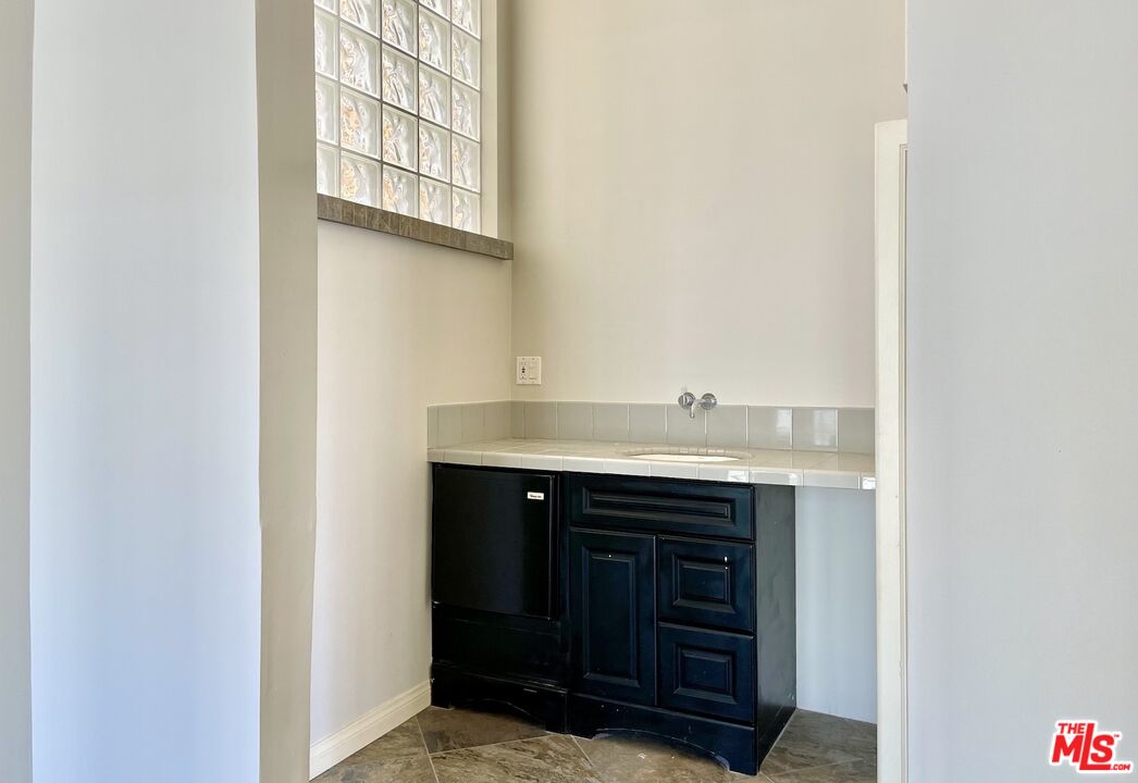 4404 Roma Court Marina del Rey, CA 90292 - Photo 15 of 31 a view of a dining room with furniture and wooden floor