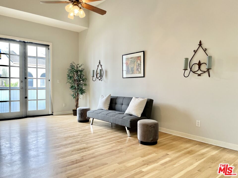 4404 Roma Court Marina del Rey, CA 90292 - Photo 8 of 31 a living room with furniture and fireplace