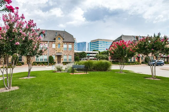 a front view of building with garden