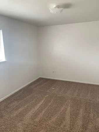 a view of a kitchen with a sink