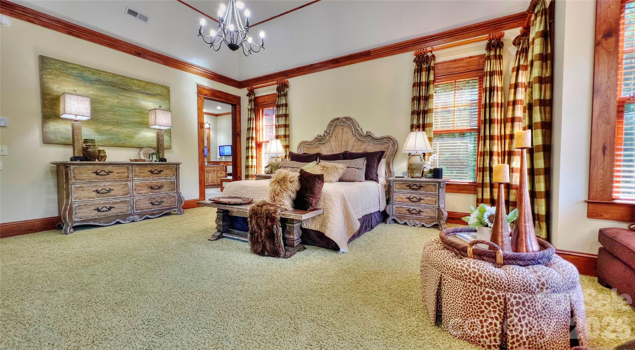 538 Chestertown Drive Mill Spring, NC 28756 - Photo 14 of 48 a living room with furniture and a chandelier