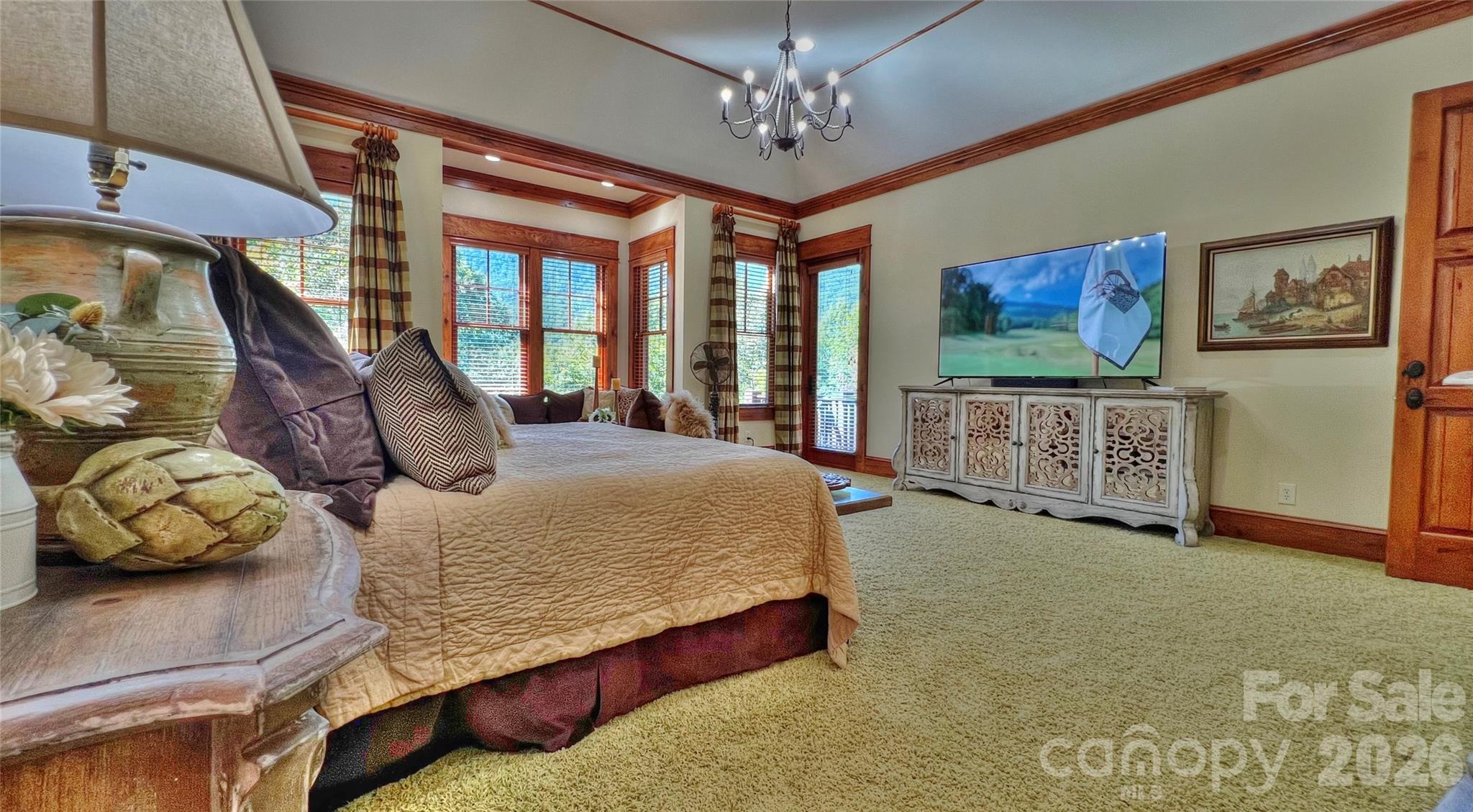 538 Chestertown Drive Mill Spring, NC 28756 - Photo 15 of 48 a bed sitting in a spacious bedroom next to a window
