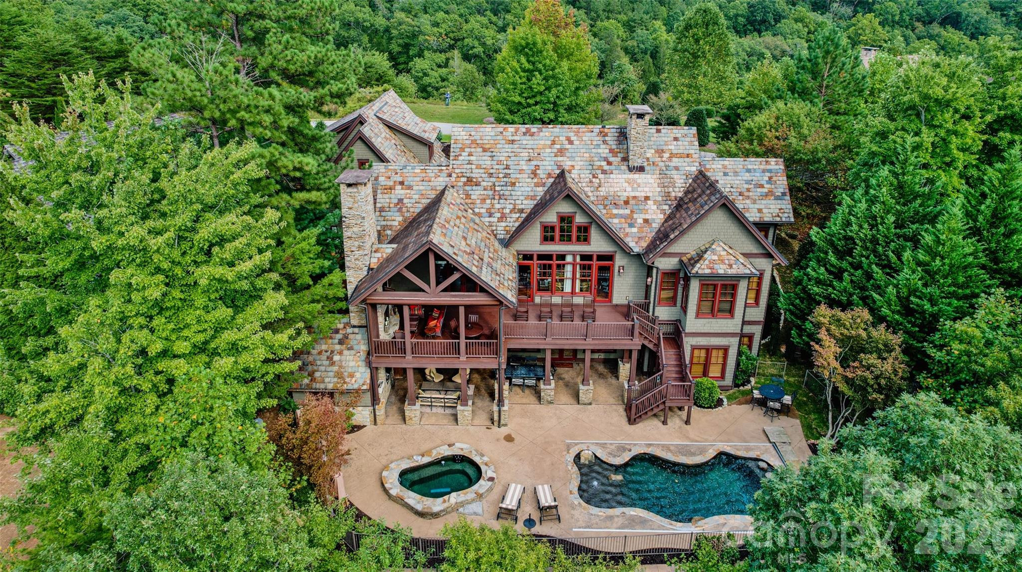 538 Chestertown Drive Mill Spring, NC 28756 - Photo 2 of 48 an aerial view of a house with swimming pool and patio
