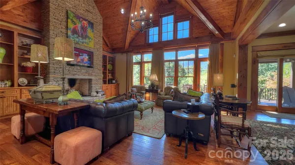 a very nice looking dining room with a large window