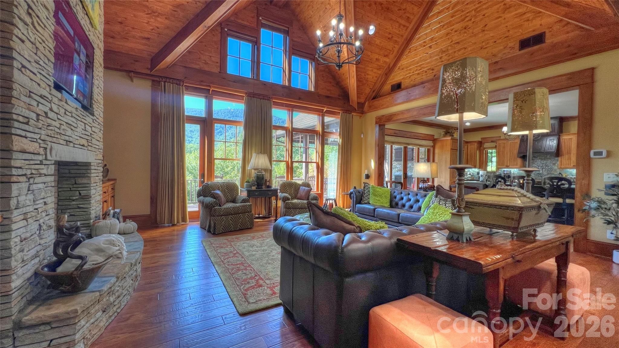 538 Chestertown Drive Mill Spring, NC 28756 - Photo 25 of 48 a living room with furniture and a large window