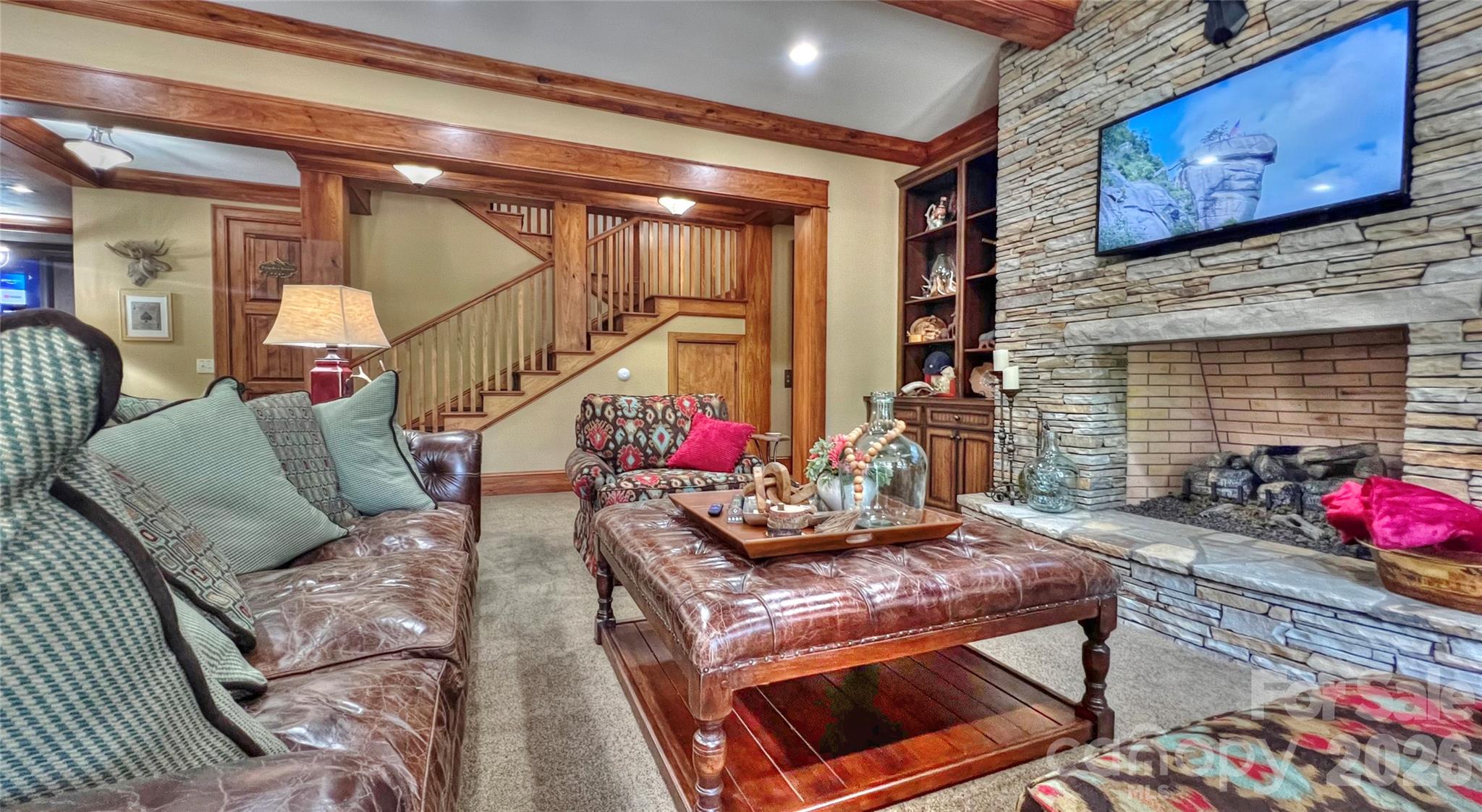 538 Chestertown Drive Mill Spring, NC 28756 - Photo 33 of 48 a living room with furniture and wooden floor