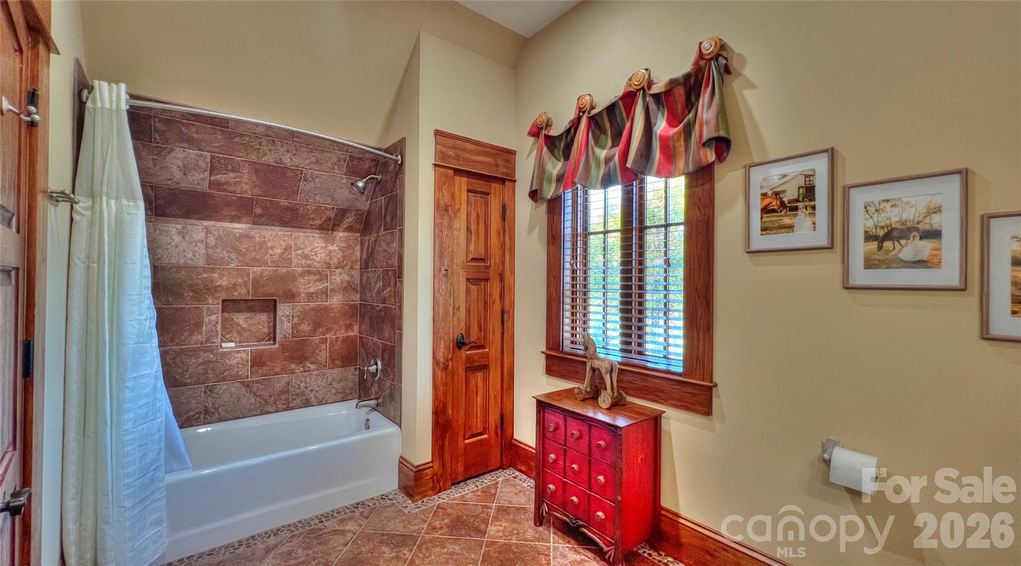 538 Chestertown Drive Mill Spring, NC 28756 - Photo 43 of 48 a bathroom with a bathtub and a shower